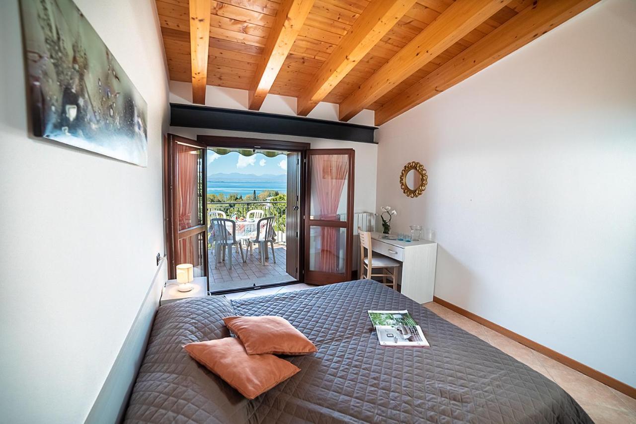 Apartments Eden - Regarda Travel Lazise Bagian luar foto